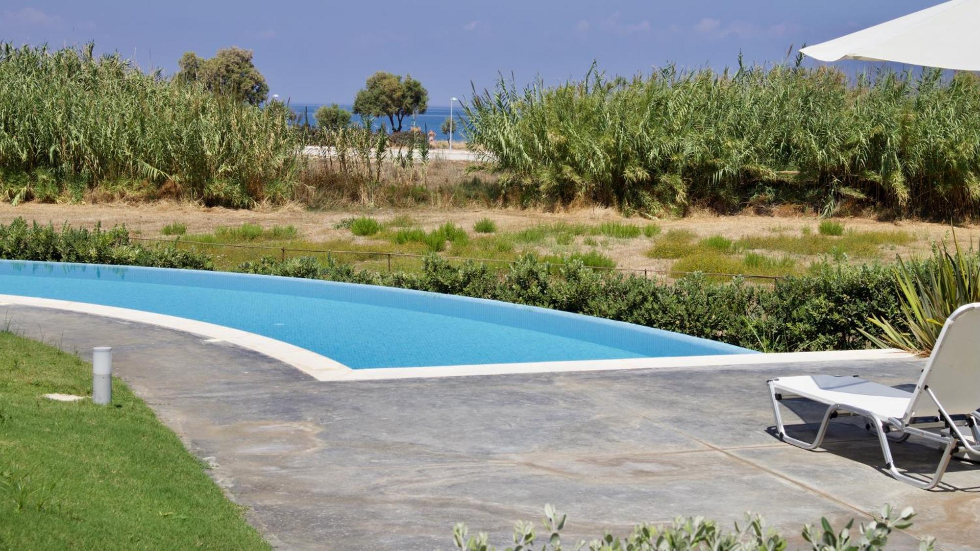 Resitour - Aphrodite Beachfront Pirgos Psilonerou الغرفة الصورة